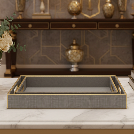 Decorative tray on a marble surface with a blurred background of decorative items.